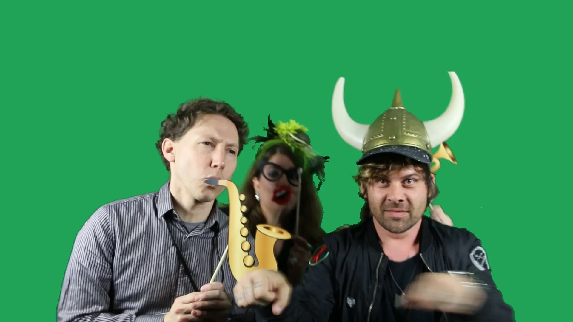 A guest starring in a green screen video activation before compositing